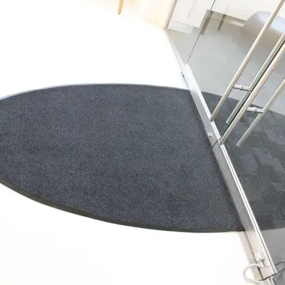 Custom made cleaning mat with a rubber edge